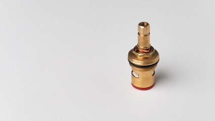 Water faucet-axle box with ceramic plates on a c background close-up macro photography