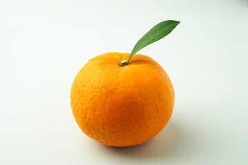 Ripe tangerines and Green orange leaves isolated on white background. Concept for Chinese Lunar New Year.