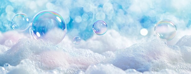 Close-up of delicate soap bubbles floating on top of soft, fluffy white foam on pastel blue background. 