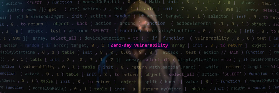 Cyber attack zero-day vulnerability text in foreground screen, hacker hidden in the blurred background. Vulnerability text in binary system ascii art style, code on editor screen. Text in English