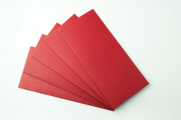 Stack of red envelopes gift isolated on white background. Concept for Chinese New Year. Empty blank copy text space. Mock up - cut out image.