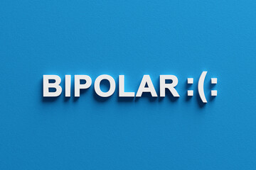 Bipolar disorder symbol balancing between happy and sad moods