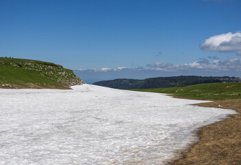 the beginning of the spring period in mountainous areas, remnants of snow cover and panoramic views...