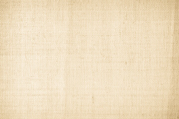 Fototapeta premium Brown sackcloth woven texture background in natural pattern. Jute hessian burlap, linen background in light beige cream color blank. Weaving canvas fiber line cotton cloth textured as organic.