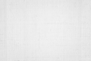 White color fabric canvas woven texture background in pattern light blank. Natural gauze linen, carpet wool and cotton cloth textile textured as clean empty for decoration text. Grey sack material.