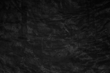 Black dark concrete wall background. Pattern board cement texture grunge dirty scratched for show anthracite promote product urban floor and abstract paper design element decor. Blackboard blank.