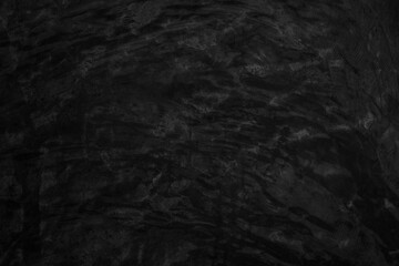 Black dark concrete wall background. Pattern board cement texture grunge dirty scratched for show anthracite promote product urban floor and abstract paper design element decor. Blackboard blank.
