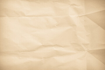 Crumpled brown paper texture background for design with copy space for text or image.