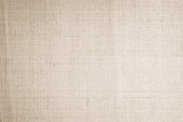 Brown sackcloth woven texture background in natural pattern. Jute hessian burlap, linen background in light beige cream color blank. Weaving canvas fiber line cotton cloth textured as organic.