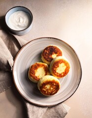 Sweet cheese pancakes syrniki