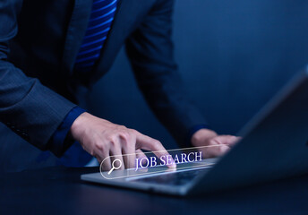 Man using laptop to search for job. Job search concept. People searching for job vacancies or...