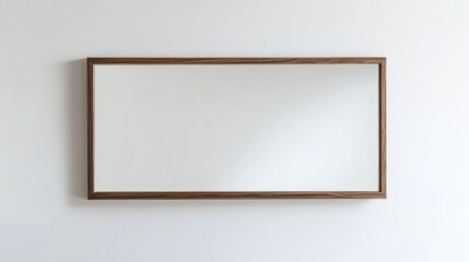 Minimalist wall-mounted mirror with a wooden edge, reflecting a seamless white background, elegant and understated.