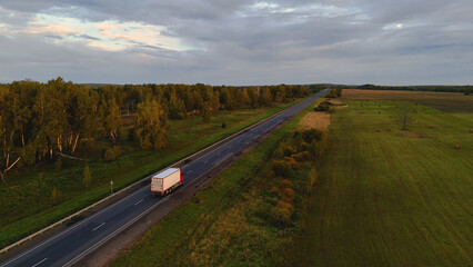 A truck is driving on the road