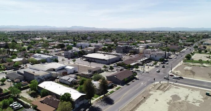 Drone footage flying by downtown los banos california