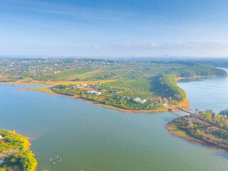 Fototapeta premium Aerial view of Bien Ho Che or Bien Ho tea fields, outside Pleiku city, Gia Lai province, Vietnam. Nature landscape, mountain and foggy far away.