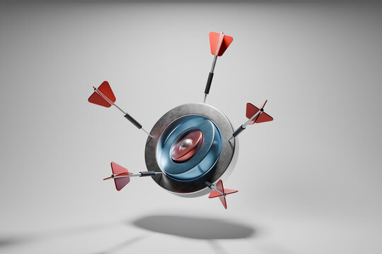 Darts hitting a metal target with precision and accuracy