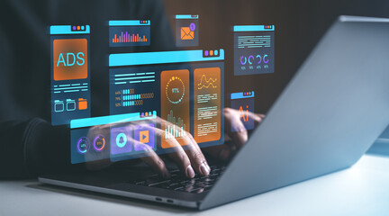 Digital analytics interface with hands typing on a laptop keyboard.