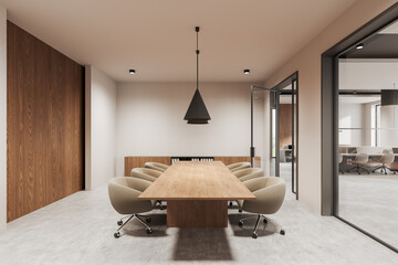 Modern meeting room with wooden table and beige chairs in a contemporary office interior design. 3D...
