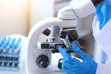 Asian female scientist researching biochemistry