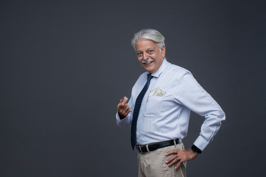 Old Man Showing Little Bit Hand Sign With Fingers