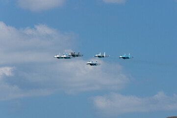 Su-30SM aircraft (NATO reporting name: Flanker-C) and five Su-27 aircraft perform formation flight over Gelendzhik Bay. Gelendzhik, Russia. Gelendzhik, Russia, September 4, 2014
