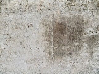 Aged exterior wall with large darker area