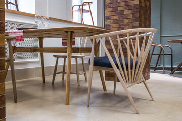 comfortable soft wooden eco chairs  with flowers  in interior