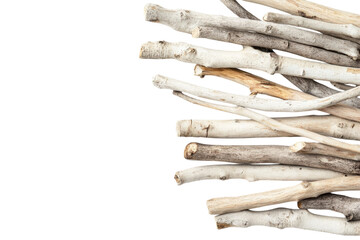 Stacked natural branches arranged artistically on a light background providing a minimalist aesthetic
