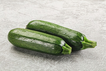 Raw green ripe zucchini vegetable