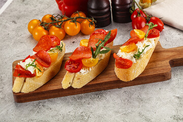 Bruschetta tapas with chorizo and tomato