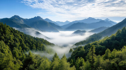Obraz premium Breathtaking mountain range with misty valleys and lush greenery