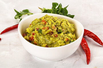 Guacamole with avocado, tomato and chili
