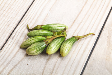 Small organic young green eggplant