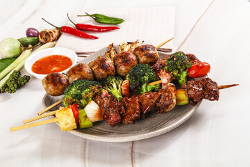 Asian grilled skewer assortment satay