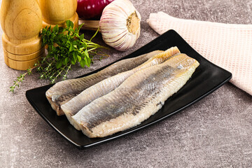 Marinated salted herring fillet apetizer