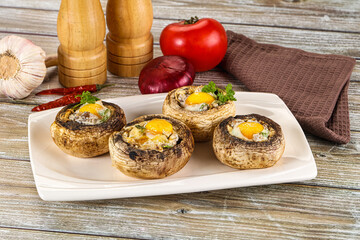 Baked champignon with quail egg