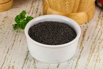 Black dry Nigella seeds in the bowl