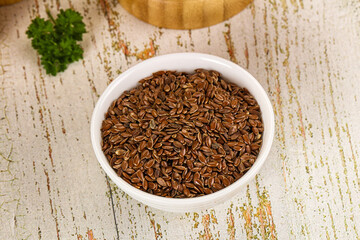 Brown flax seeds in the bowl
