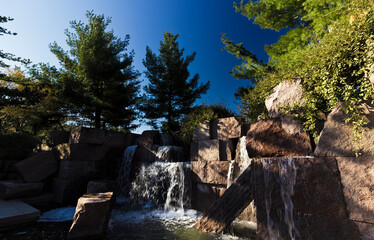 A spring scene from the Third Term Room of the Franklin D. Roosevelt Memorial featuring a cascading waterfall, West Potomac Park, Washington DC