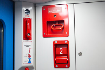 Emergency brake in the train with instructions for use.