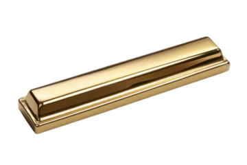Golden harmonica resting on a surface, reflecting light in a warm atmosphere during a music session
