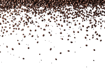 Coffee beans cascading down from above against a white background creating a dynamic visual effect