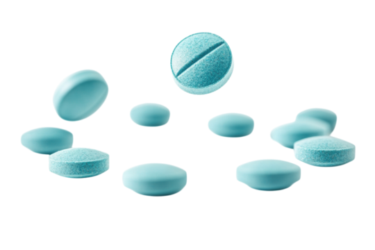 Blue tablets fall gracefully on a white surface, creating a striking visual display of medication