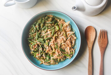 Mixed vegetables topped with peanut sauce.Traditional indonesian salad with steamed vegetables and peanut dressing.