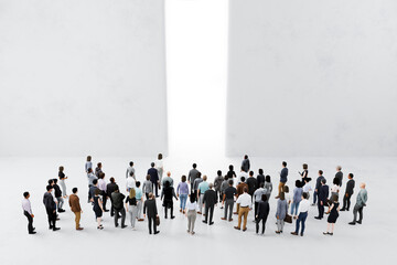 Group of business people in front of bright opening symbolizing opportunity