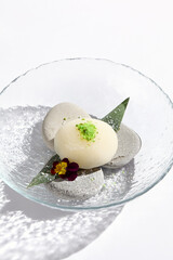 Elegant Presentation of Mochi on Stones in a Clear Bowl with Minimalist Aesthetic