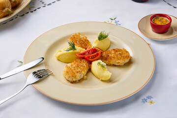 Crisp Chicken Cutlets with Mashed Potatoes on Elegant Plate