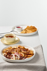 Exquisite Pancake Breakfast with Assorted Fillings on Linen Tablecloth A Study in Minimalist Elegance and Subtle Lighting