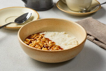 Delicious Rice Porridge with Peanuts and Caramel in Warm Tones