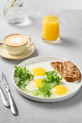 Bright Morning Eggs Sunny Side Up with Toast in Minimalist Pastel Setting